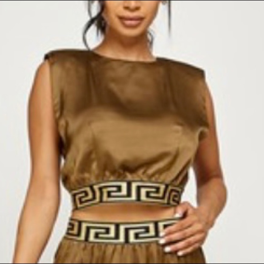 All I can say is WOW!  This is a show stopper. Satan 2 piece jumpsuit is must - Picture 3 of 4